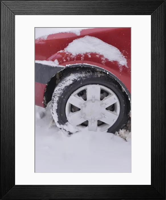 Framed Print : Car with winter tires on the snow covered road Framed Print : Car with winter tires on the snow covered road
