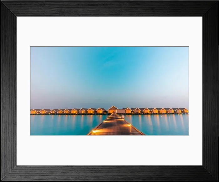 Framed Print : Sunset landscape on Maldives island beach, water villas resort. Beautiful sky and clouds Framed Print : Sunset landscape on Maldives island beach, water villas resort. Beautiful sky and clouds