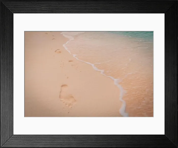 Framed Print : Footprints in the sand near the sea. Beach, wave and footprints at sunset time, dream beach landscape, waves Framed Print : Footprints in the sand near the sea. Beach, wave and footprints at sunset time, dream beach landscape, waves