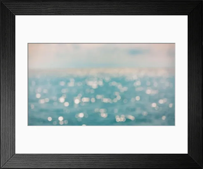 Framed Print : Background of blurred sunset beach and sea waves with bokeh lights. Artistic ocean blur Framed Print : Background of blurred sunset beach and sea waves with bokeh lights. Artistic ocean blur