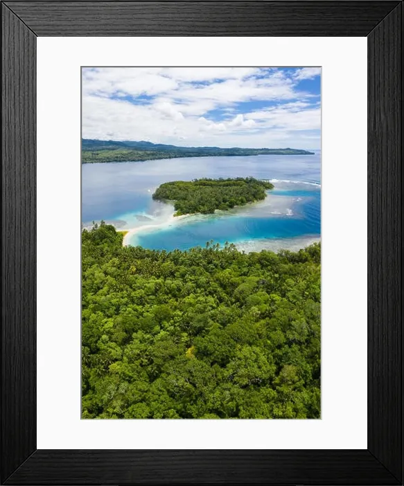 Framed Print : A coral reef surrounds idyllic, tropical islands off the coast of New Britain in Papua New Guinea. This area is part of the Coral Triangle Framed Print : A coral reef surrounds idyllic, tropical islands off the coast of New Britain in Papua New Guinea. This area is part of the Coral Triangle