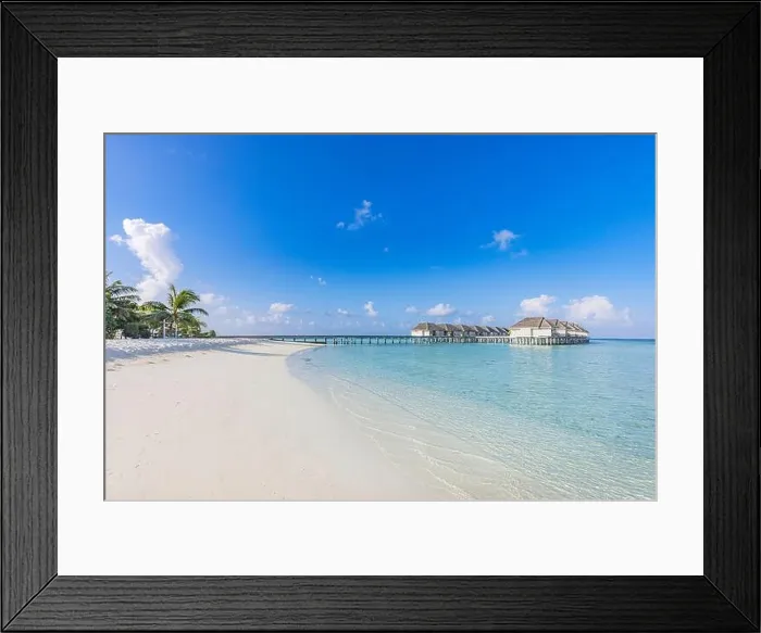 Framed Print : Amazing tropical Maldives resort hotel and island with beach sand and sea on sky holiday vacation background concept. Soft sunrise light palm trees
