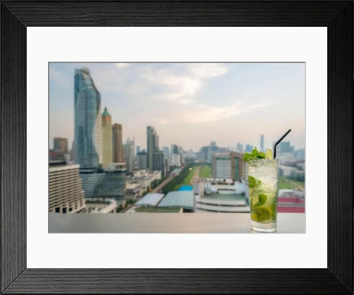 Framed Print : Mojito cocktail on table in rooftop bar with Bangkok city view point in Bangkok Thailand. Beautiful rooftop bar in Bangkok Framed Print : Mojito cocktail on table in rooftop bar with Bangkok city view point in Bangkok Thailand. Beautiful rooftop bar in Bangkok