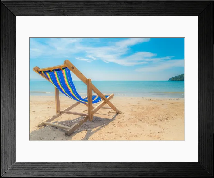 Framed Print : One beach chairs on the white sand with blue sky and summer sea background. Summer, Vacation, Travel and Holiday concept Framed Print : One beach chairs on the white sand with blue sky and summer sea background. Summer, Vacation, Travel and Holiday concept