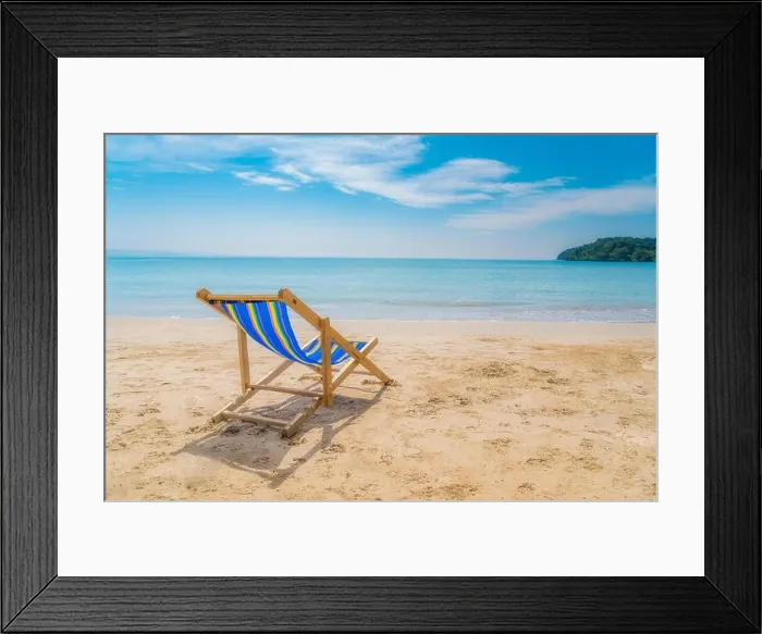 Framed Print : One beach chairs on the white sand with blue sky and summer sea background. Summer, Vacation, Travel and Holiday concept Framed Print : One beach chairs on the white sand with blue sky and summer sea background. Summer, Vacation, Travel and Holiday concept