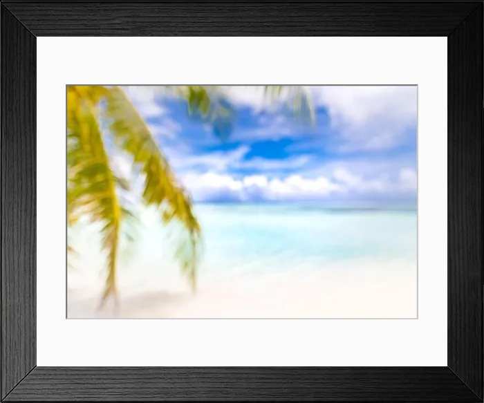 Framed Print : Blurred blue sky and sea with bokeh light and leaves of coconut palm tree. Landscape of tropical summer. Summer vacation concept. Luxury dream travel Framed Print : Blurred blue sky and sea with bokeh light and leaves of coconut palm tree. Landscape of tropical summer. Summer vacation concept. Luxury dream travel