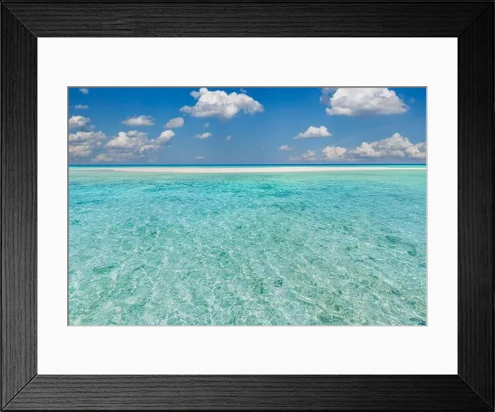 Framed Print : Amazing nature of tropical summer beach. White sandy beach, lagoon sea water against blue sky with white clouds. Copy space, summer vacation concept Framed Print : Amazing nature of tropical summer beach. White sandy beach, lagoon sea water against blue sky with white clouds. Copy space, summer vacation concept