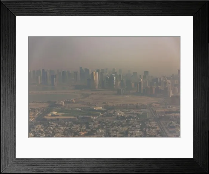 Framed Print : DUBAI, UAE - APRIL 29: Aerial view of Downtown Dubai and skyscrapers during morning sandstorm. Highway and trainline, soft light over the sand Framed Print : DUBAI, UAE - APRIL 29: Aerial view of Downtown Dubai and skyscrapers during morning sandstorm. Highway and trainline, soft light over the sand