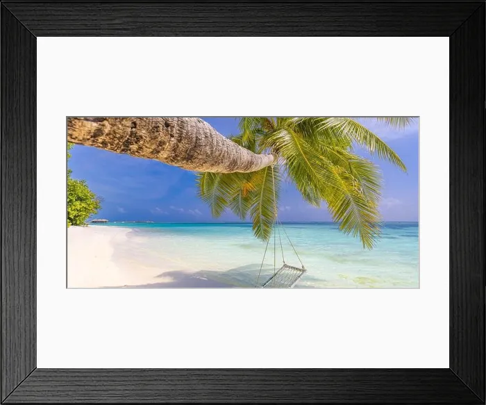 Framed Print : Tropical beach panoramic paradise. Summer island landscape, swing or hammock on palm tree. Sea sand sky as serene beach. Luxury beach scenic vacation Framed Print : Tropical beach panoramic paradise. Summer island landscape, swing or hammock on palm tree. Sea sand sky as serene beach. Luxury beach scenic vacation