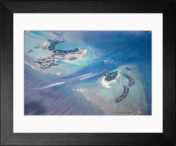 Framed Print : Fantastic aerial landscape, luxury tropical resort or hotel with water villas and beautiful beach scenic. Amazing bird eyes view in Maldives landscape Framed Print : Fantastic aerial landscape, luxury tropical resort or hotel with water villas and beautiful beach scenic. Amazing bird eyes view in Maldives landscape