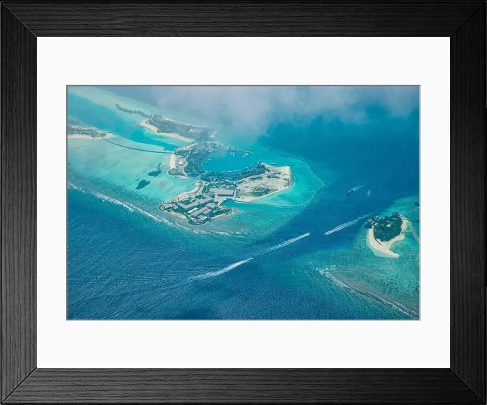 Framed Print : Fantastic aerial landscape, luxury tropical resort or hotel with water villas and beautiful beach scenic. Amazing bird eyes view in Maldives landscape Framed Print : Fantastic aerial landscape, luxury tropical resort or hotel with water villas and beautiful beach scenic. Amazing bird eyes view in Maldives landscape