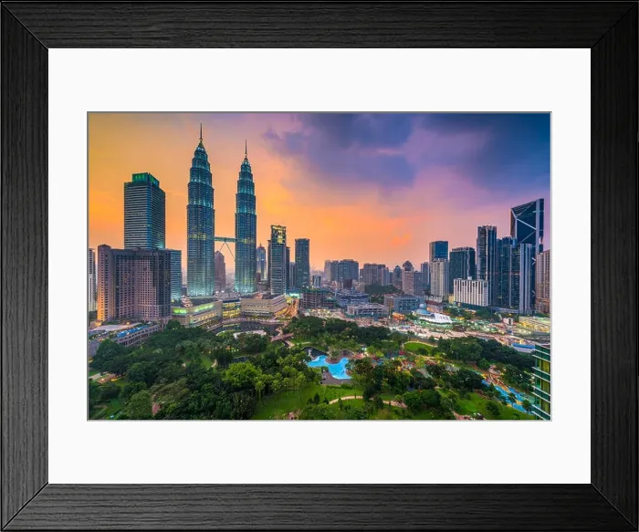Framed Print : Kuala Lumpur, Malaysia skyline at dusk over the park Framed Print : Kuala Lumpur, Malaysia skyline at dusk over the park