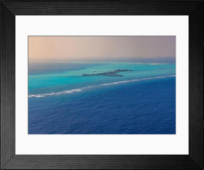 Framed Print : Fantastic aerial landscape, luxury tropical resort or hotel with water villas and beautiful beach scenic. Amazing bird eyes view in Maldives landscape