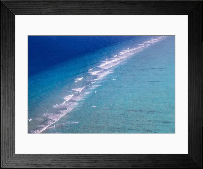 Framed Print : Tropical islands and atolls in Maldives from aerial view. Famous travel destination and luxury vacation or summer holiday concept. Aerial landscape Framed Print : Tropical islands and atolls in Maldives from aerial view. Famous travel destination and luxury vacation or summer holiday concept. Aerial landscape