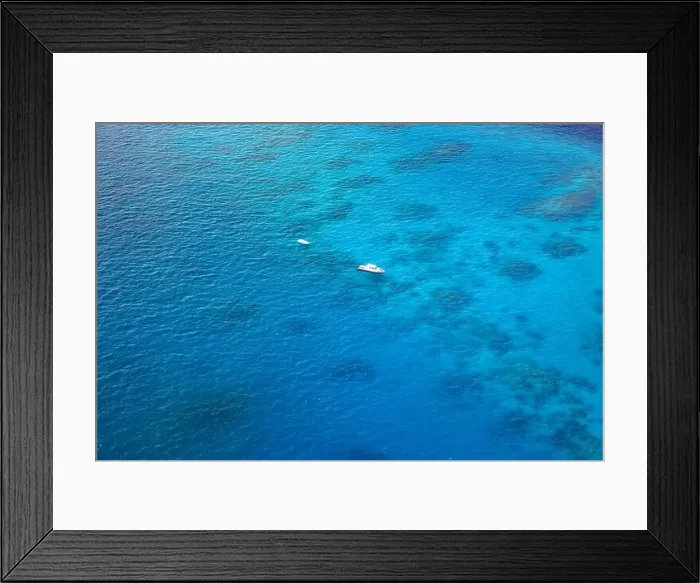 Framed Print : Aerial view sailing boat next to reef. Bird eye view, water sport theme. Snorkel excursion, recreational dive with tourist. Luxury water sport diving Framed Print : Aerial view sailing boat next to reef. Bird eye view, water sport theme. Snorkel excursion, recreational dive with tourist. Luxury water sport diving