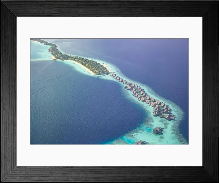 Framed Print : Fantastic aerial landscape, luxury tropical resort or hotel with water villas and beautiful beach scenic. Amazing bird eyes view in Maldives landscape