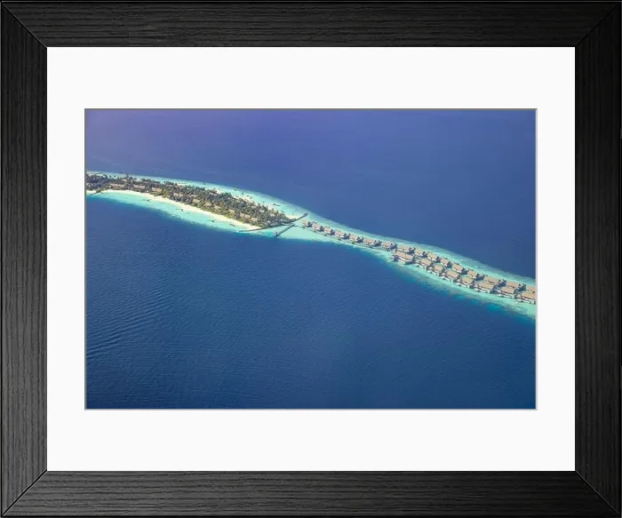 Framed Print : Fantastic aerial landscape, luxury tropical resort or hotel with water villas and beautiful beach scenic. Amazing bird eyes view in Maldives landscape Framed Print : Fantastic aerial landscape, luxury tropical resort or hotel with water villas and beautiful beach scenic. Amazing bird eyes view in Maldives landscape