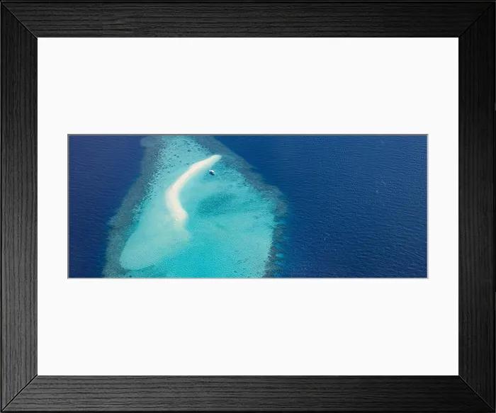 Framed Print : Aerial picture of turquoise blue tropical ocean lagoon, white sandy beach, sandbank coral reef shallow water with boat. Nature perfection in Maldives Framed Print : Aerial picture of turquoise blue tropical ocean lagoon, white sandy beach, sandbank coral reef shallow water with boat. Nature perfection in Maldives
