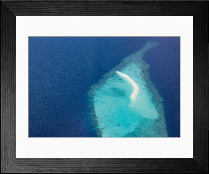 Framed Print : Aerial picture of turquoise blue tropical ocean lagoon, white sandy beach, sandbank coral reef shallow water with boat. Nature perfection in Maldives Framed Print : Aerial picture of turquoise blue tropical ocean lagoon, white sandy beach, sandbank coral reef shallow water with boat. Nature perfection in Maldives