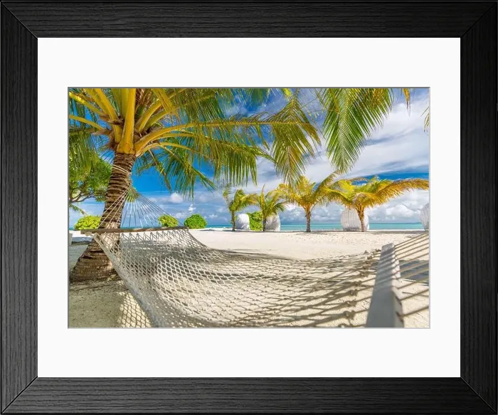 Framed Print : Hammock between two coconut trees on a tropical island with beautiful beach. Luxury summer travel beach sand with palm trees, sunny paradise landscape Framed Print : Hammock between two coconut trees on a tropical island with beautiful beach. Luxury summer travel beach sand with palm trees, sunny paradise landscape