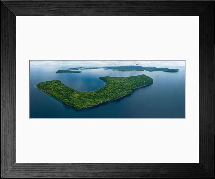 Framed Print : Lush, tropical islands are fringed by diverse coral reefs in the Solomon Islands. This beautiful country is home to spectacular marine biodiversity Framed Print : Lush, tropical islands are fringed by diverse coral reefs in the Solomon Islands. This beautiful country is home to spectacular marine biodiversity