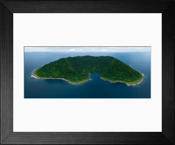 Framed Print : Rainforest covers the remote Mary Island which is fringed by a coral reef in the Solomon Islands. This country is home to amazing marine biodiversity Framed Print : Rainforest covers the remote Mary Island which is fringed by a coral reef in the Solomon Islands. This country is home to amazing marine biodiversity