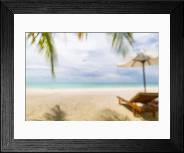 Framed Print : Summer exotic sandy beach with blur palms and sea on background. Dream vacation background with palm leaves and sea view. Summer paradise island beach Framed Print : Summer exotic sandy beach with blur palms and sea on background. Dream vacation background with palm leaves and sea view. Summer paradise island beach