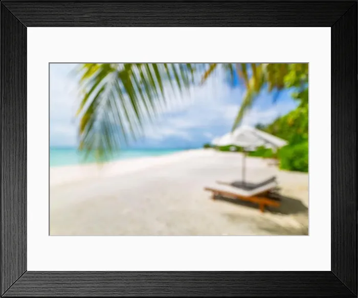 Framed Print : Summer exotic sandy beach with blur palms and sea on background. Dream vacation background with palm leaves and sea view. Summer paradise island beach Framed Print : Summer exotic sandy beach with blur palms and sea on background. Dream vacation background with palm leaves and sea view. Summer paradise island beach