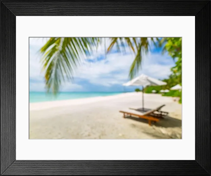 Framed Print : Summer exotic sandy beach with blur palms and sea on background. Dream vacation background with palm leaves and sea view. Summer paradise island beach Framed Print : Summer exotic sandy beach with blur palms and sea on background. Dream vacation background with palm leaves and sea view. Summer paradise island beach