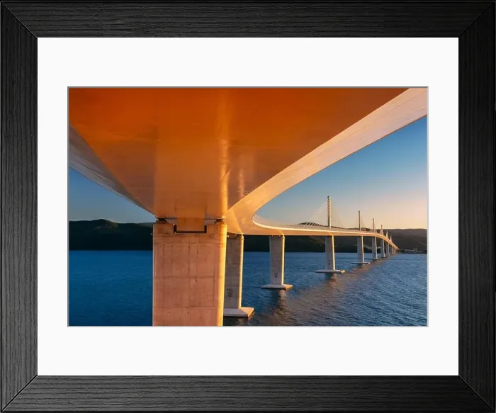 Framed Print : Peljesac Bridge, Croatia. Image of beautiful modern multi-span cable-stayed Peljesac Bridge over the sea in Dubrovnik-Neretva County, Croatia at sunse Framed Print : Peljesac Bridge, Croatia. Image of beautiful modern multi-span cable-stayed Peljesac Bridge over the sea in Dubrovnik-Neretva County, Croatia at sunse