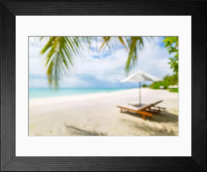 Framed Print : Summer exotic sandy beach with blur palms and sea on background. Dream vacation background with palm leaves and sea view. Summer paradise island beach Framed Print : Summer exotic sandy beach with blur palms and sea on background. Dream vacation background with palm leaves and sea view. Summer paradise island beach