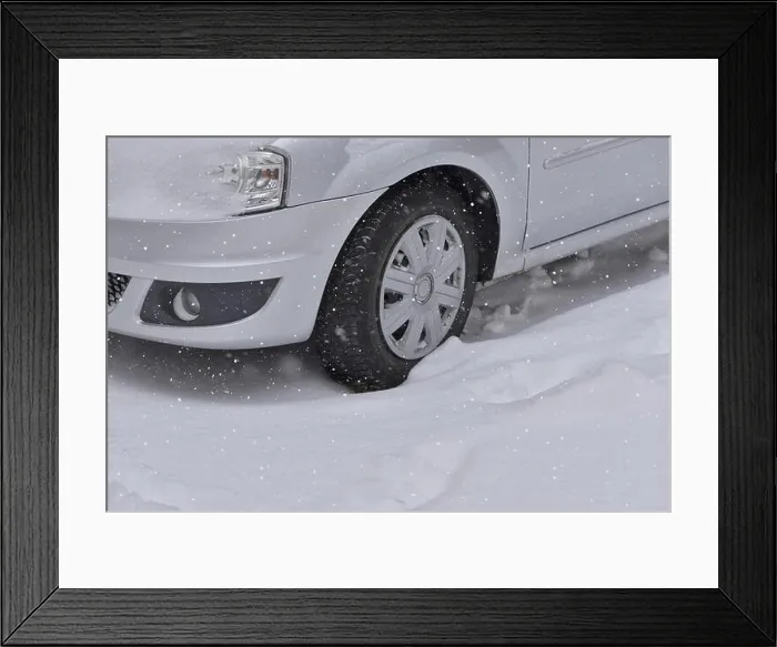 Framed Print : Car with winter tires on the snow covered road Framed Print : Car with winter tires on the snow covered road