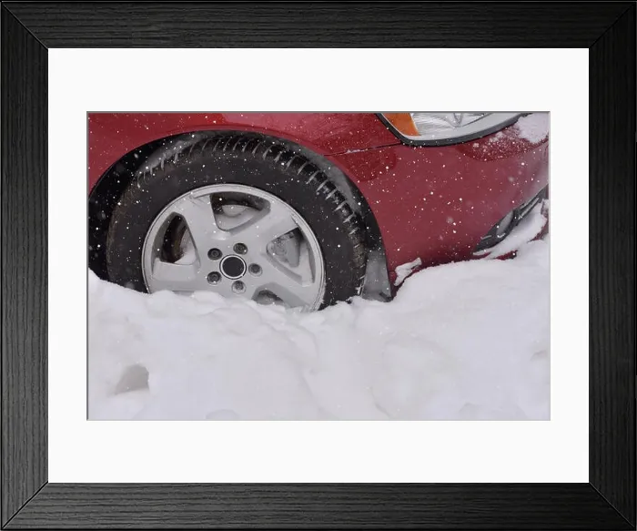 Framed Print : Car with winter tires on the snow covered road Framed Print : Car with winter tires on the snow covered road