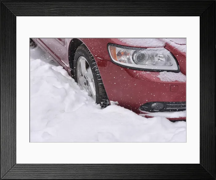 Framed Print : Car with winter tires on the snow covered road Framed Print : Car with winter tires on the snow covered road