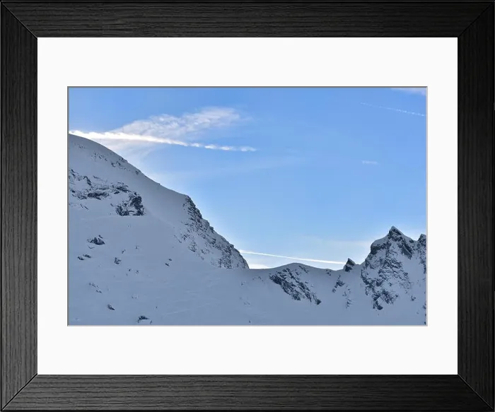 Framed Print : Beautiful view of mountain peak with sunset light on top against clear blue sky Framed Print : Beautiful view of mountain peak with sunset light on top against clear blue sky