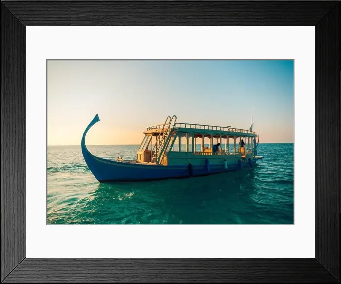 Framed Print : Maldives background with boat and tropical beach scene, blue sea and blue sky with colorful traditional Maldive boat Framed Print : Maldives background with boat and tropical beach scene, blue sea and blue sky with colorful traditional Maldive boat