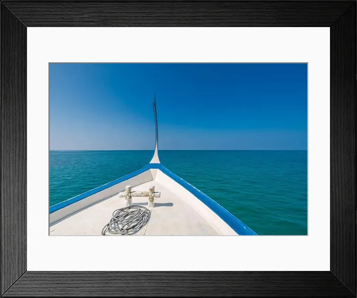 Framed Print : Maldives background with boat and tropical beach scene, blue sea and blue sky with colorful traditional Maldive boat Framed Print : Maldives background with boat and tropical beach scene, blue sea and blue sky with colorful traditional Maldive boat