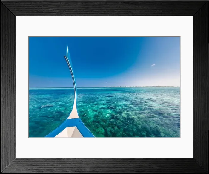 Framed Print : Maldives background with boat and tropical beach scene, blue sea and blue sky with colorful traditional Maldive boat Framed Print : Maldives background with boat and tropical beach scene, blue sea and blue sky with colorful traditional Maldive boat