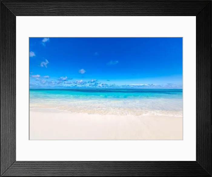 Framed Print : Empty tropical beach with soft waves splashing background. Horizon with sky and white sand. Idyllic beach landscape, island shoreline Framed Print : Empty tropical beach with soft waves splashing background. Horizon with sky and white sand. Idyllic beach landscape, island shoreline