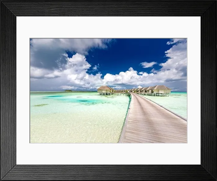 Framed Print : Panoramic landscape of Maldives beach. Tropical panorama, luxury water villa resort with wooden pier or jetty. Luxury travel destination background Framed Print : Panoramic landscape of Maldives beach. Tropical panorama, luxury water villa resort with wooden pier or jetty. Luxury travel destination background