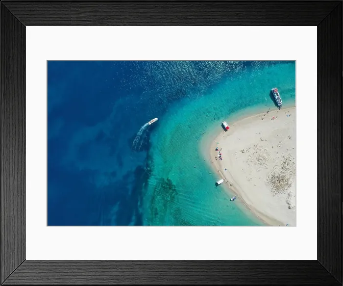 Framed Print : Aerial drone view of iconic small uninhabited island of Marathonisi featuring clear water, sandy shore and natural hatchery of Caretta-Caretta sea tur Framed Print : Aerial drone view of iconic small uninhabited island of Marathonisi featuring clear water, sandy shore and natural hatchery of Caretta-Caretta sea tur