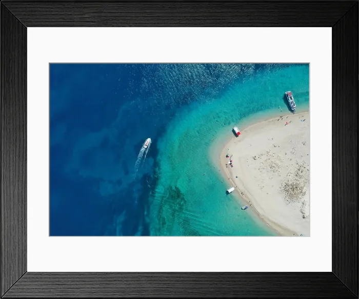 Framed Print : Aerial drone view of iconic small uninhabited island of Marathonisi featuring clear water, sandy shore and natural hatchery of Caretta-Caretta sea tur Framed Print : Aerial drone view of iconic small uninhabited island of Marathonisi featuring clear water, sandy shore and natural hatchery of Caretta-Caretta sea tur