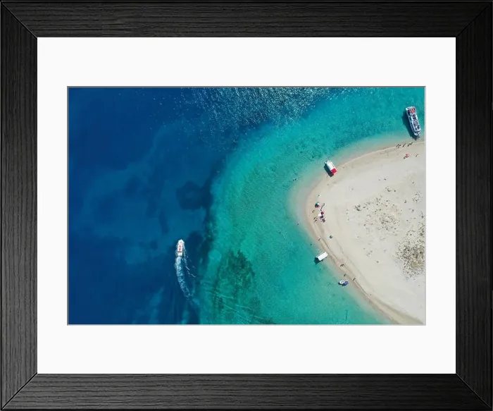 Framed Print : Aerial drone view of iconic small uninhabited island of Marathonisi featuring clear water, sandy shore and natural hatchery of Caretta-Caretta sea tur Framed Print : Aerial drone view of iconic small uninhabited island of Marathonisi featuring clear water, sandy shore and natural hatchery of Caretta-Caretta sea tur