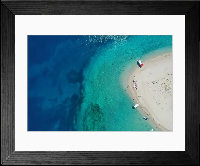 Framed Print : Aerial drone view of iconic small uninhabited island of Marathonisi featuring clear water, sandy shore and natural hatchery of Caretta-Caretta sea tur Framed Print : Aerial drone view of iconic small uninhabited island of Marathonisi featuring clear water, sandy shore and natural hatchery of Caretta-Caretta sea tur