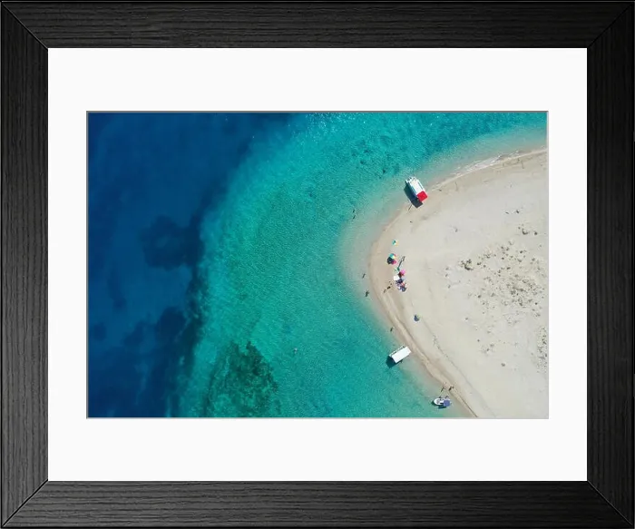 Framed Print : Aerial drone view of iconic small uninhabited island of Marathonisi featuring clear water, sandy shore and natural hatchery of Caretta-Caretta sea tur Framed Print : Aerial drone view of iconic small uninhabited island of Marathonisi featuring clear water, sandy shore and natural hatchery of Caretta-Caretta sea tur