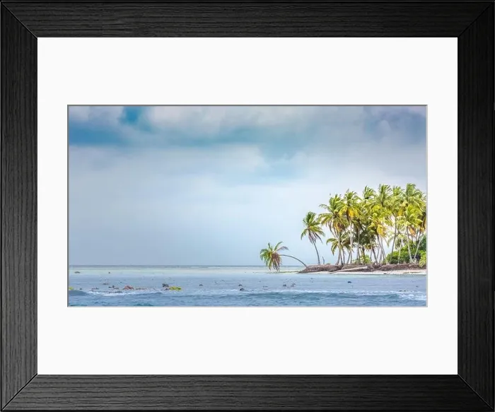 Framed Print : Cloudy tropical island coast or shoreline, palm trees and storm clouds with wavey sea or ocean water. Exotic destination island coastline Framed Print : Cloudy tropical island coast or shoreline, palm trees and storm clouds with wavey sea or ocean water. Exotic destination island coastline