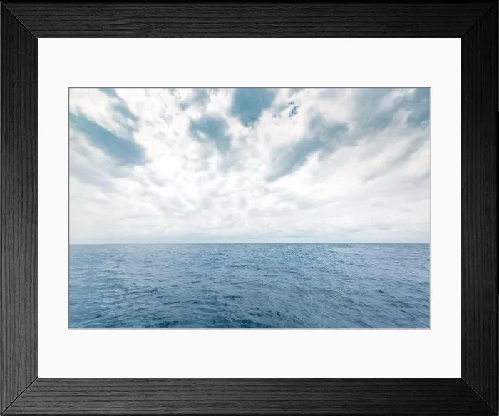 Framed Print : Panoramic beautiful seascape with cloud on a sunny day. Overcast sea or ocean water with horizon Framed Print : Panoramic beautiful seascape with cloud on a sunny day. Overcast sea or ocean water with horizon