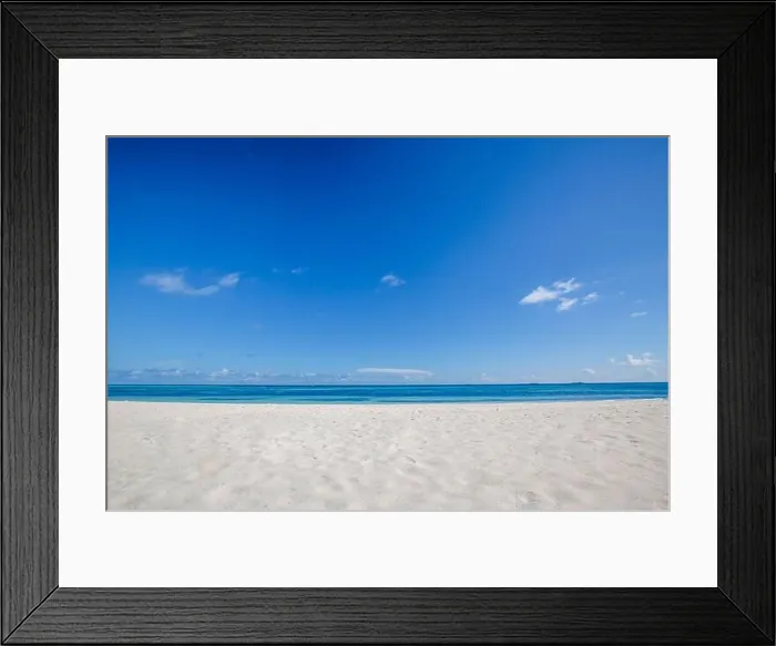 Framed Print : Beach view over white sand and blue sky. Idyllic tropical nature pattern. Exotic landscape, summer beach with sea view. Vacation mood and copy space Framed Print : Beach view over white sand and blue sky. Idyllic tropical nature pattern. Exotic landscape, summer beach with sea view. Vacation mood and copy space