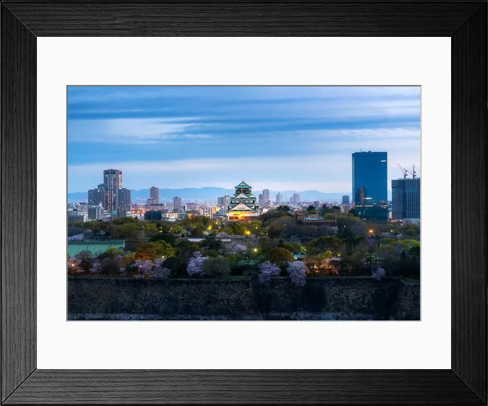 Framed Print : Osaka castle with cherry blossom and business district in background at Osaka, Japan Framed Print : Osaka castle with cherry blossom and business district in background at Osaka, Japan