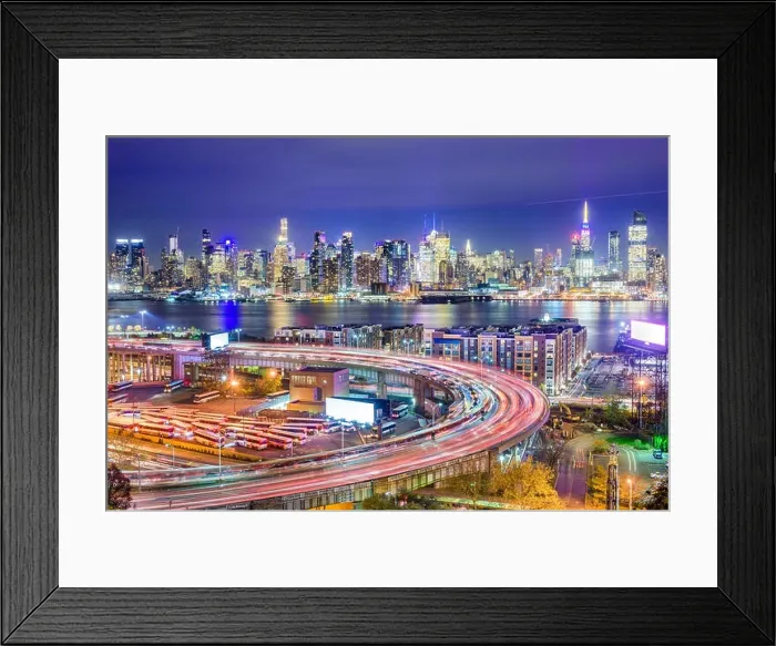 Framed Print : New York, New York, USA cityscape and highways from across the Hudson River at night Framed Print : New York, New York, USA cityscape and highways from across the Hudson River at night